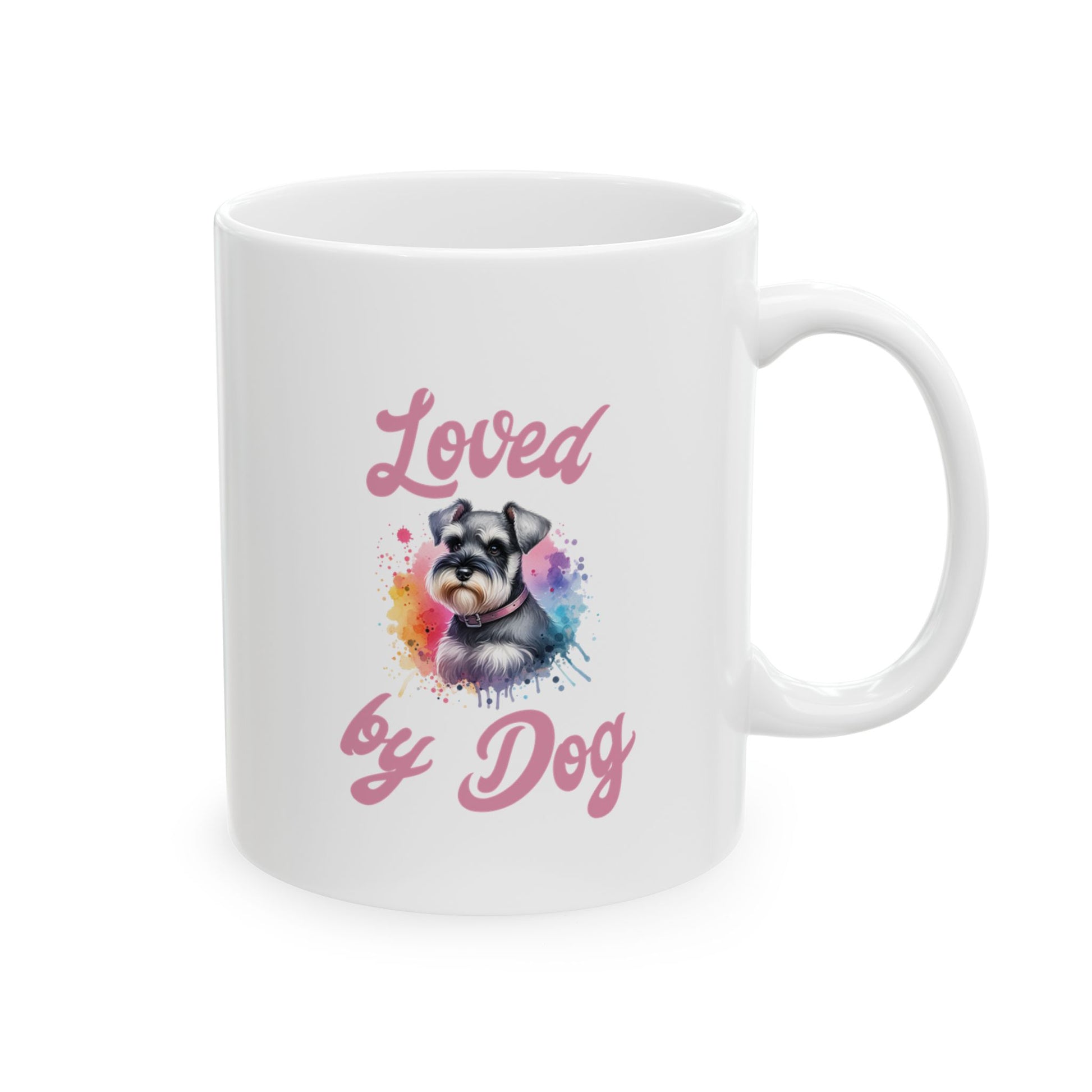 The D&B Apparel Miniature Schnauzer Ceramic Mug (available in 11oz and 15oz) is BPA-free and customizable, showcasing a colorful schnauzer illustration with Loved by Dog in pink cursive above and below the pup.