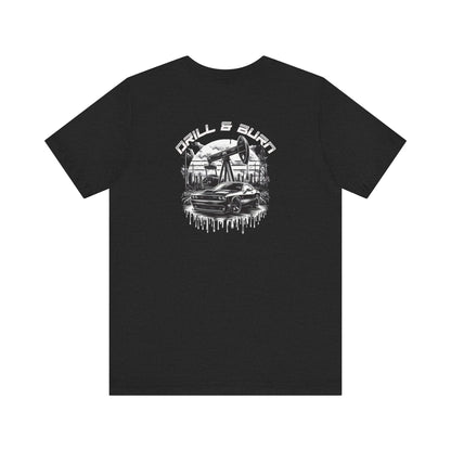 The Vintage Car Graphic Unisex Tee by Printify features a black tee with an oil pumpjack, a muscle car, and DRILL & BURN text. The design includes a white dripping paint effect, blending casual fashion with breathable fabric for ultimate comfort.