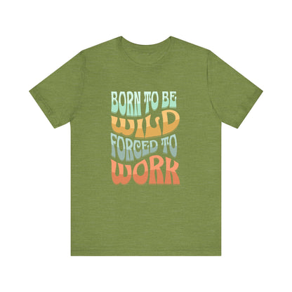 The D&B Apparel Born to Be Wild Unisex Jersey Tee features soft Airlume cotton and retro-style text in light blue, orange, and red saying Born to be wild, forced to work. This stylish tee adds a classic vibe with a modern twist for those who love adventure.