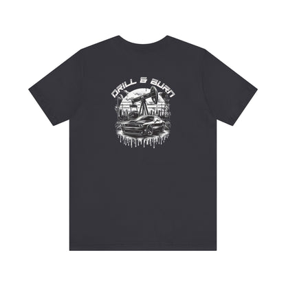 Printifys Vintage Car Graphic Unisex Tee features a breathable fabric with an eye-catching back graphic of an oil pump and car, topped off with DRILL & BURN in white silhouettes and dripping effects, making it a standout casual fashion statement.