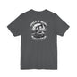Black Drill & Burn Graphic Unisex Jersey Tee is shown from the front, highlighting an oil drilling scene with a Dodge Challenger doing a burnout.  embodying casual fashion. With breathable fabric, this dark gray tee ensures comfort.